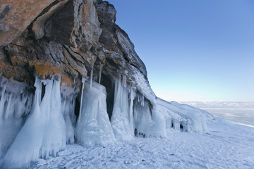 Fototapeta na wymiar Icicles in Ogoi island rock. Lake Baikal winter landscape