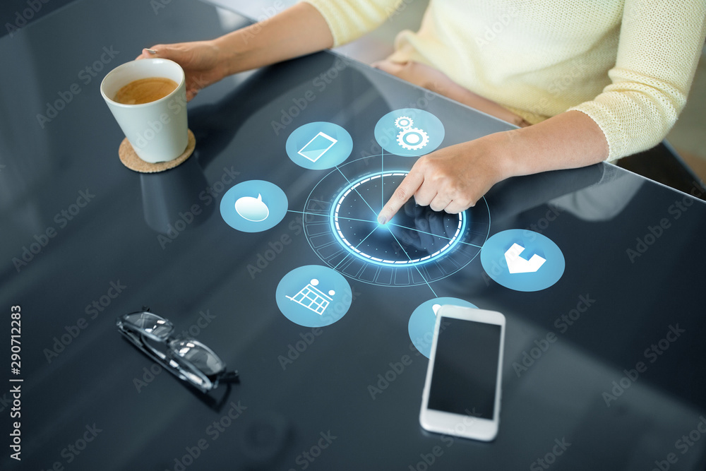 Poster technology and people concept - close up of woman using interactive panel with virtual app icons on 