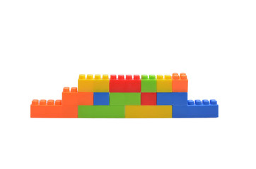 Plastic building blocks isolated on white background : soft focus