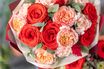 Closeup Beautiful bouquet of mixed flowers. the work of the florist at a flower shop. Fresh cut flower.