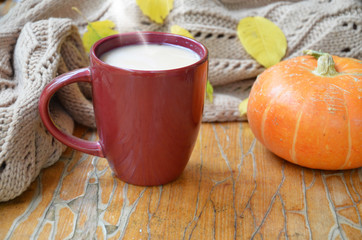 Pumpkin Spice Latte. Cup of Latte with Seasonal Autumn Spices, Cookies and Fall Decor. Traditional Coffee Drink for Autumn Holidays.