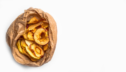Tasty dried apples chips isolated on white background