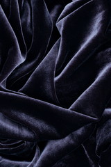 velvet texture dark blue color background, expensive luxury fabric,  wallpaper. copy space. Eclipse...