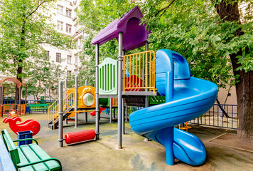 Modern playground in the courtyard of a residential building