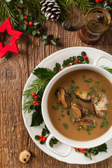 Traditional mushroom soup, made from porcini mushrooms. Christmas decoration.