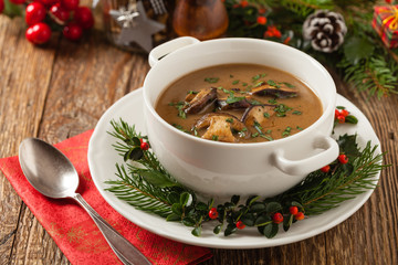 Traditional mushroom soup, made from porcini mushrooms. Christmas decoration.