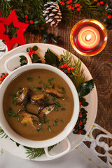 Traditional mushroom soup, made from porcini mushrooms. Christmas decoration.