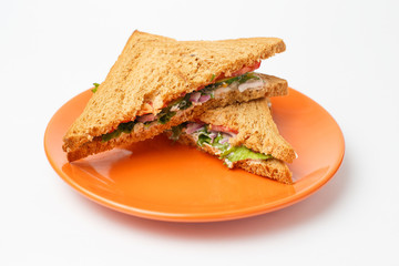 sandwich on a plate on white background