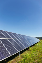 Solar Power Station on the summer Meadow 
