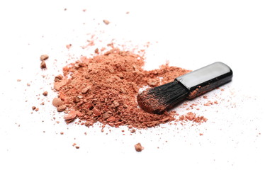 Face powder makeup, crushed blusher balls and brush, isolated on white background