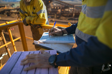 Miner supervisor sigh of working at height working permit prior to performing high risk work on...