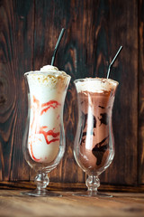 Two glasses of milkshake