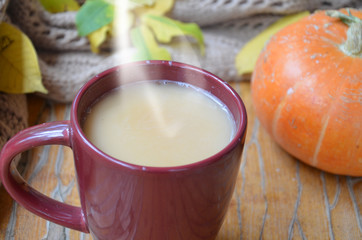 Pumpkin Spice Latte. Cup of Latte with Seasonal Autumn Spices, Cookies and Fall Decor. Traditional Coffee Drink for Autumn Holidays.