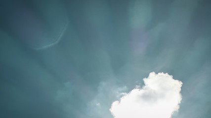 Cloudy Blue Sky With Lens Flare