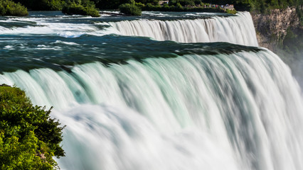 Niagara River and the mighty Niagara Falls. Nature and sights of America. Long exposure shot