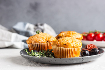 Savory muffins with sun dried tomatoes and olives.