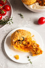 Savory muffins with sun dried tomatoes and olives.