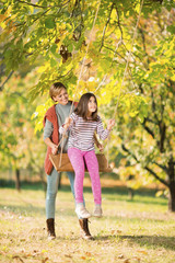 Fototapeta premium Beautiful mother and daughter outdoors