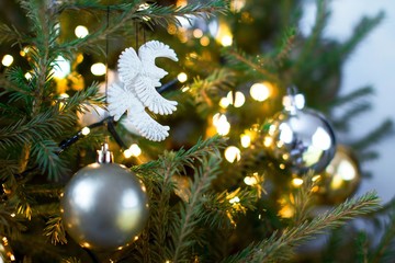 white dove christmas ornaments on christmas tree