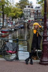 Fototapeta na wymiar The beautiful city of Amsterdam. Bikes on the bridge