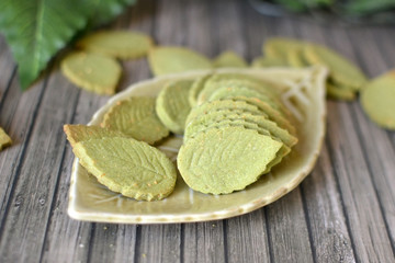 Flat lay background with orange, black and white seasonal paper craft Halloween gift boxes around border and copy space in middle