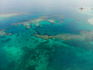 Fototapeta na wymiar Turquoise water over coral reefs