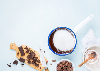Dough preparation recipe cake, brownie, muffins, cupcakes ingridients, food flat lay on light background, text space. Working with butter, chocolate, cocoa, sugar, bakery cooking. Text space.