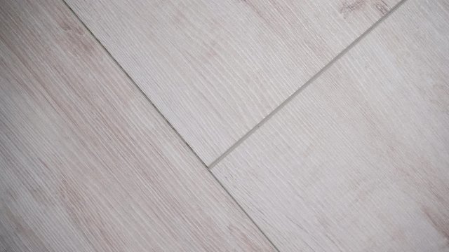 Textures and patterns concept. Detailed close up of bright wooden boards panel floor texture background