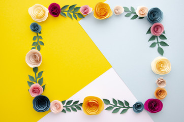 Flat lay multicolored background with floral frame