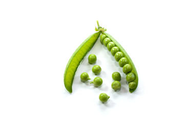 green peas in a pod isolated on white
