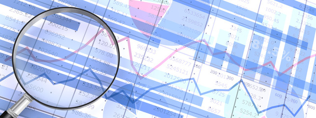 ビジネス資料と虫眼鏡