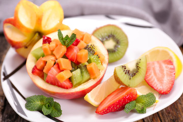 mixed fruit salad with apple, mango, berry fruit
