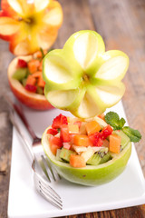 mixed fruit salad with apple, mango, berry fruit