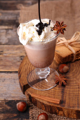 coffee shake with whipped cream, chocolate and spices