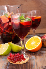 Fototapeta na wymiar festive wine with fruit, mulled red wine with fruit and spices