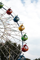 Ferris wheel against the sky. children attractions. Leisure, carousel