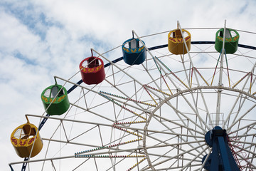 Ferris wheel against the sky. children attractions. Leisure, carousel