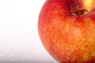 Gros plan d'un bout de nectarine