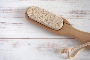 Pumice on a wooden background, zero waste concept. Copy space