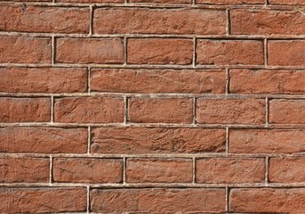 Red old brick wall. Close-up. Texture.