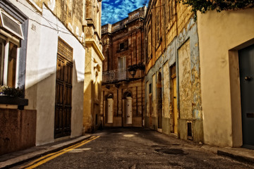 Fototapeta na wymiar Typical Narrow Road in Gharghur, Malta