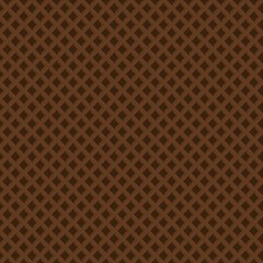 Seamless pattern of chocolate brown crispy waffles texture.