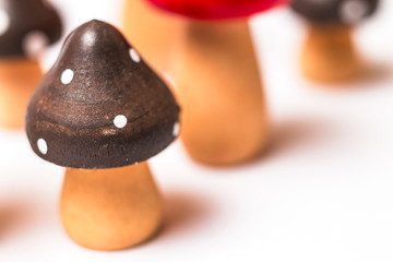 toadstools made of wood on a white background