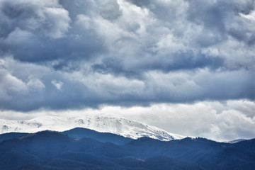 Fototapeta na wymiar Mountain landscape with storm clouds, Tarcu mountains