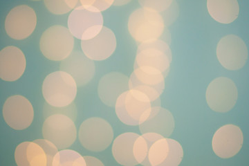 Blurry points of light on a blue background. Christmas and holiday.