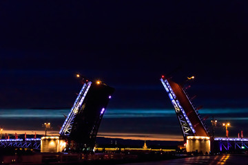Naklejka na ściany i meble Opening of Palace drawbridge. Night view of Palace bridge from the Neva river in Saint Petersburg, Russia