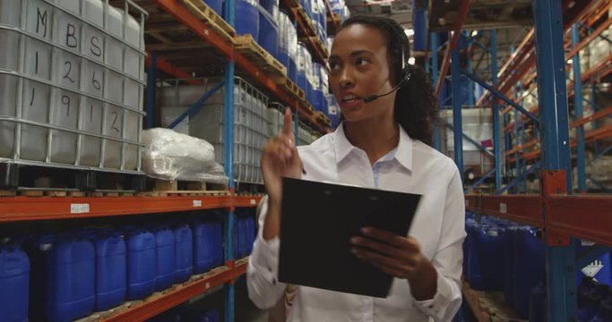 Young female manager in a warehouse