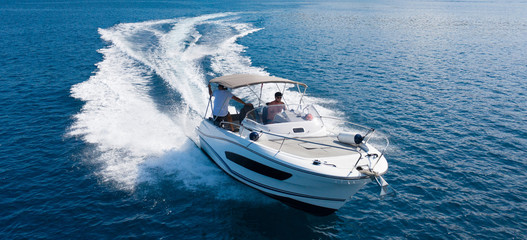 Fototapeta High speed motor boat on open sea. obraz