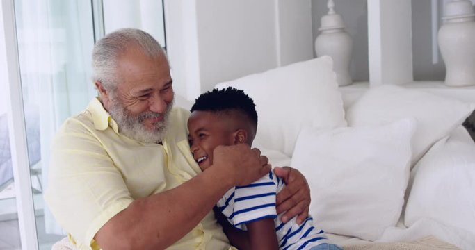 Mature man enjoying time with his grandson