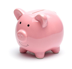 Pink piggy bank isolated on a white background